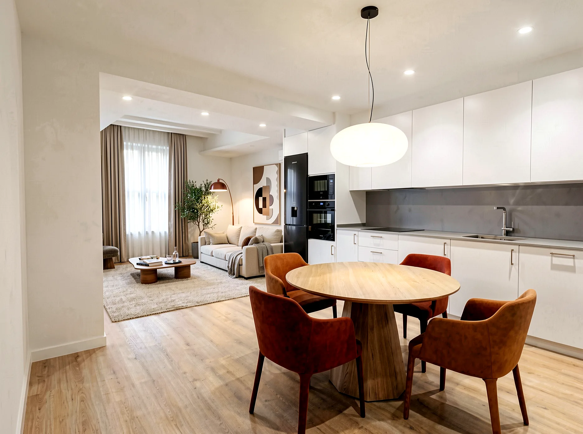 Cuina i saló contemporanis d'un habitatge reformat a PI14